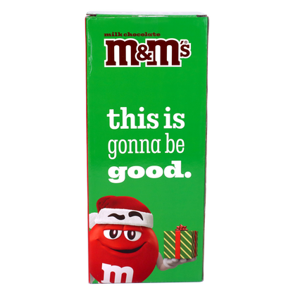 Back of packaging which includes red m&m character in a santa hat holding a present with the text "this is gonna be good." displayed above it.