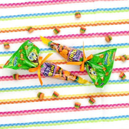 two Krabby patties carrot bags lying down on patterned background